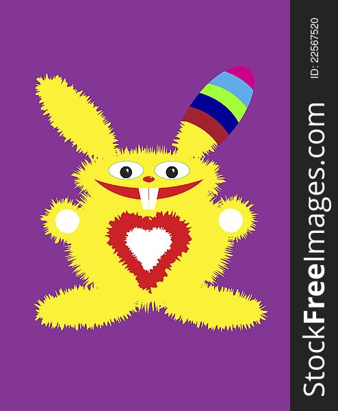 The yellow fluffy hare in a color cap smiles. The yellow fluffy hare in a color cap smiles