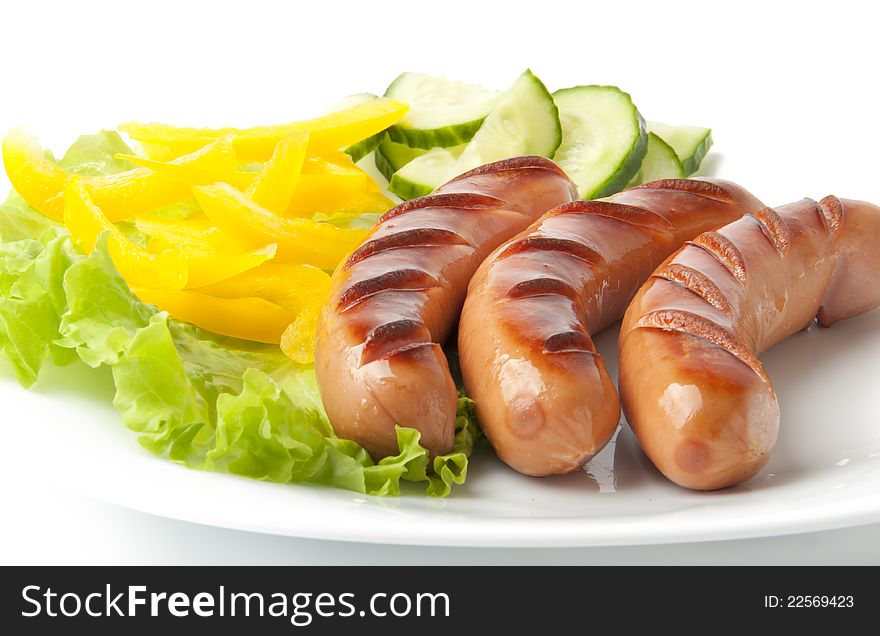 Very vskusnye sausages on the grill