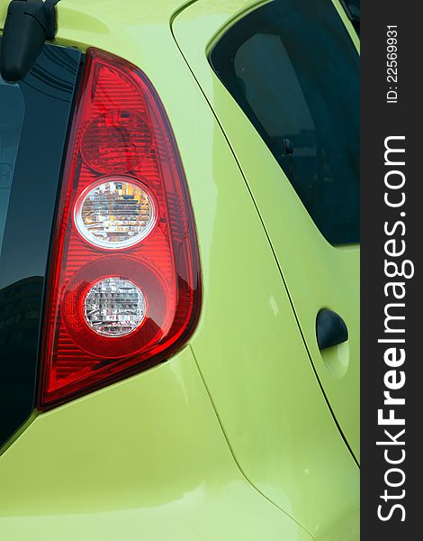 The posterior close-up of green car