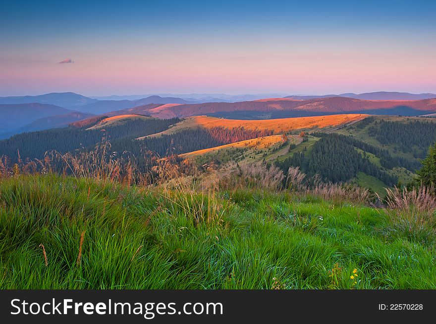 Landscape in the mountains with sunset. Ukraine, the Carpathian mountains. Landscape in the mountains with sunset. Ukraine, the Carpathian mountains