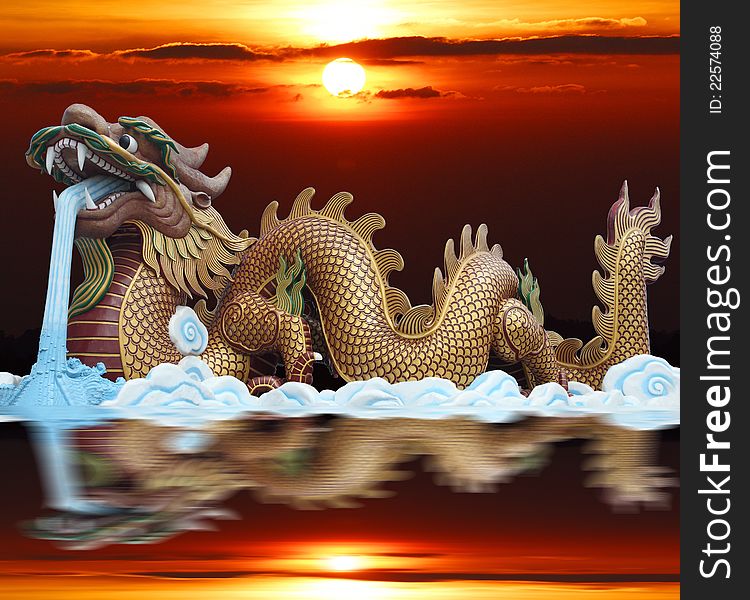 Golden dragon with red column and sunrise.
