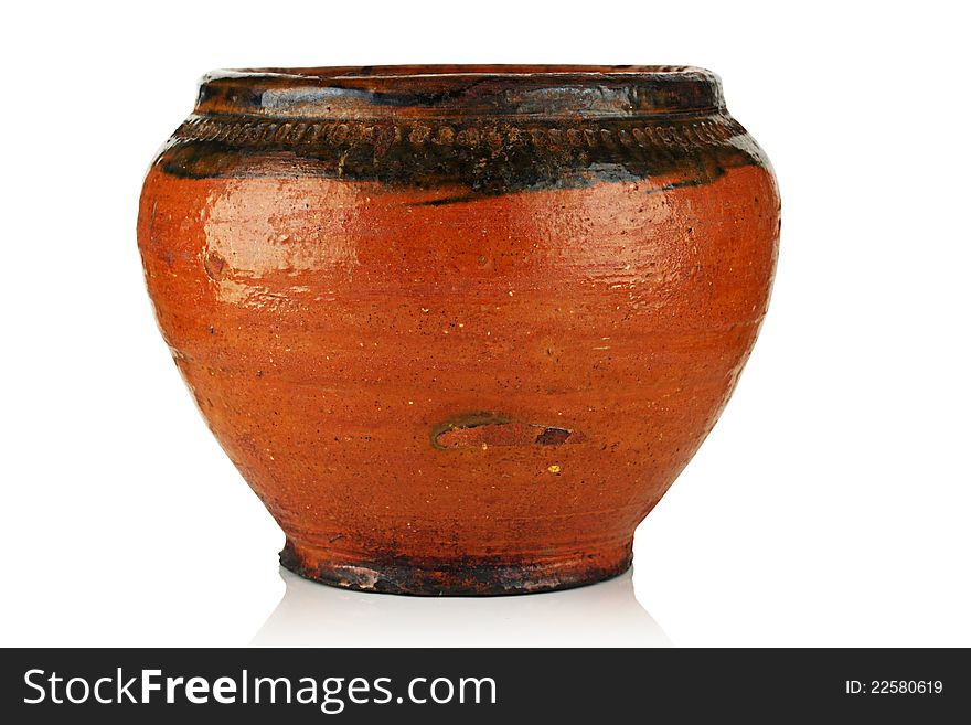 A clay pot on a white background. A clay pot on a white background.