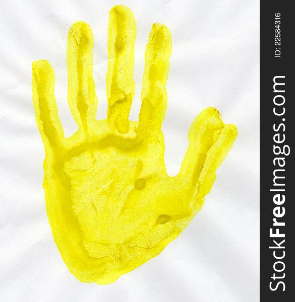 Yellow stamp handprint