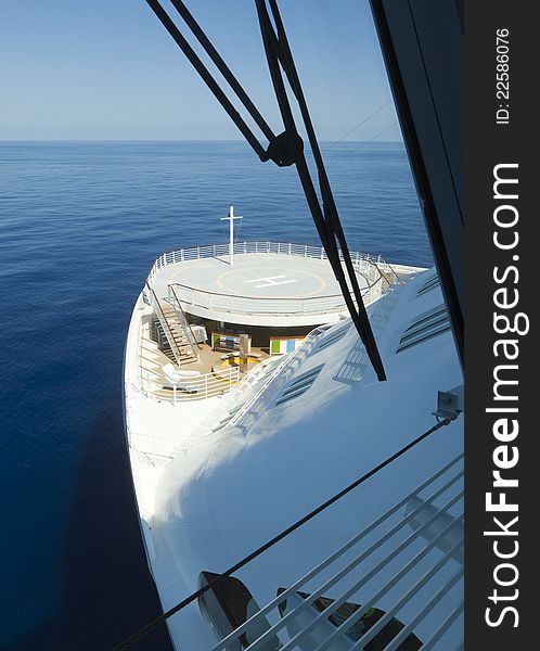 A frontview from the bridge on a cruiseship with a landing platform. A frontview from the bridge on a cruiseship with a landing platform