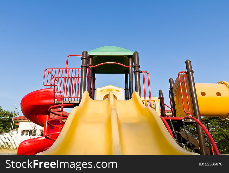 An image of a colorful children playground, without children. An image of a colorful children playground, without children