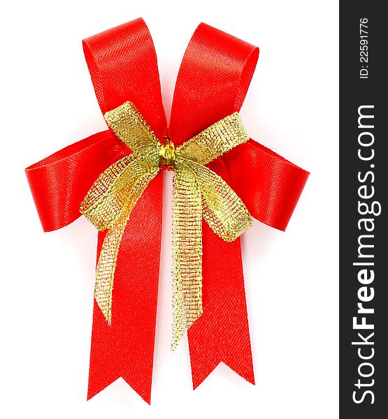 Bright red bow over white background