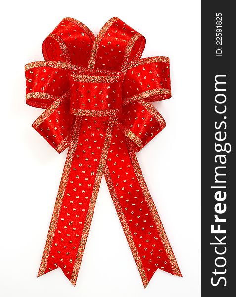 Red bow over white background