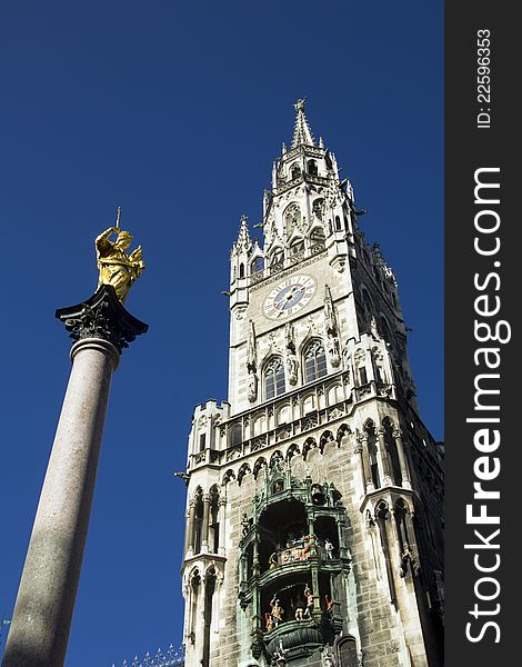 The Neues Rathaus (new city town hall) and MariensÃ¤ule (Mary's column) in Marienplatz, the main square in the Bavarian capital. The city hall has the famous Glockenspiel which attracts millions of tourists.