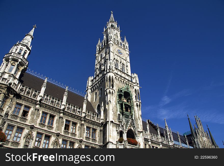 The Neues Rathaus (new city town hall) in Marienplatz, the main square in the Bavarian capital of Munich. The city hall has the famous Glockenspiel which attracts millions of tourists. The Neues Rathaus (new city town hall) in Marienplatz, the main square in the Bavarian capital of Munich. The city hall has the famous Glockenspiel which attracts millions of tourists.
