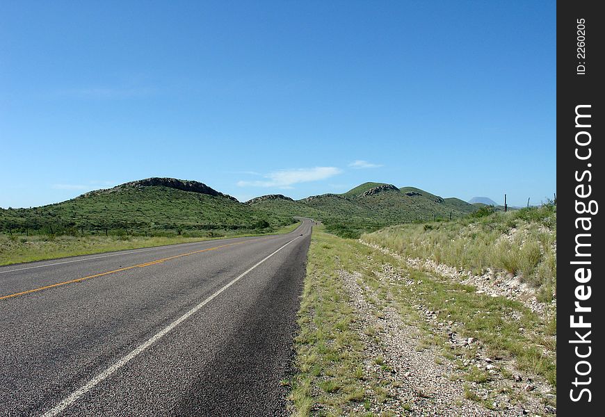 A straight road leading to Big Bend national park