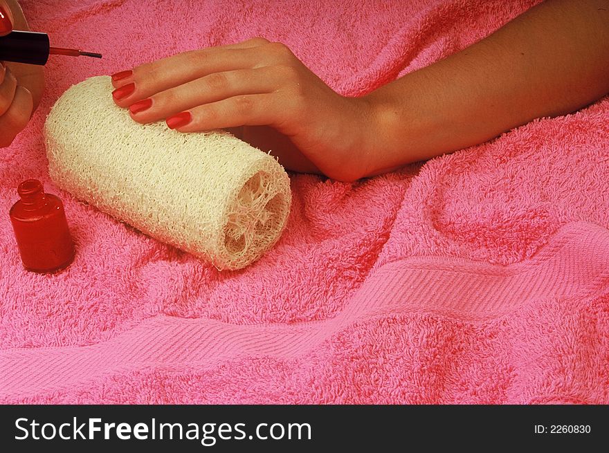 Manicure woman on the pink background