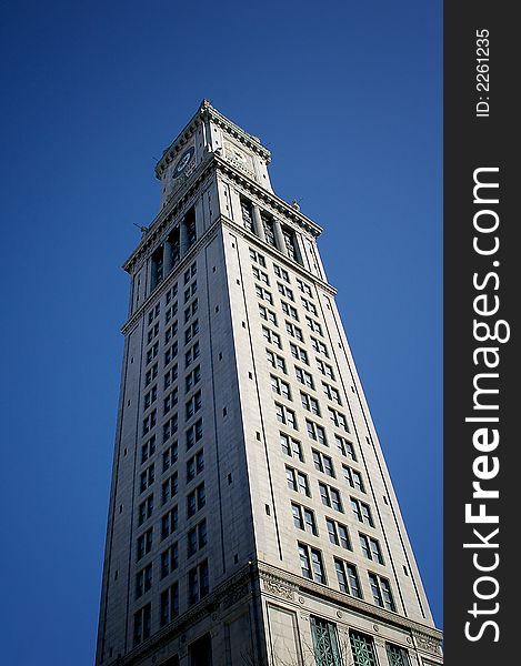 View of Boston's Custom House Tower with bright blue clear skies. View of Boston's Custom House Tower with bright blue clear skies