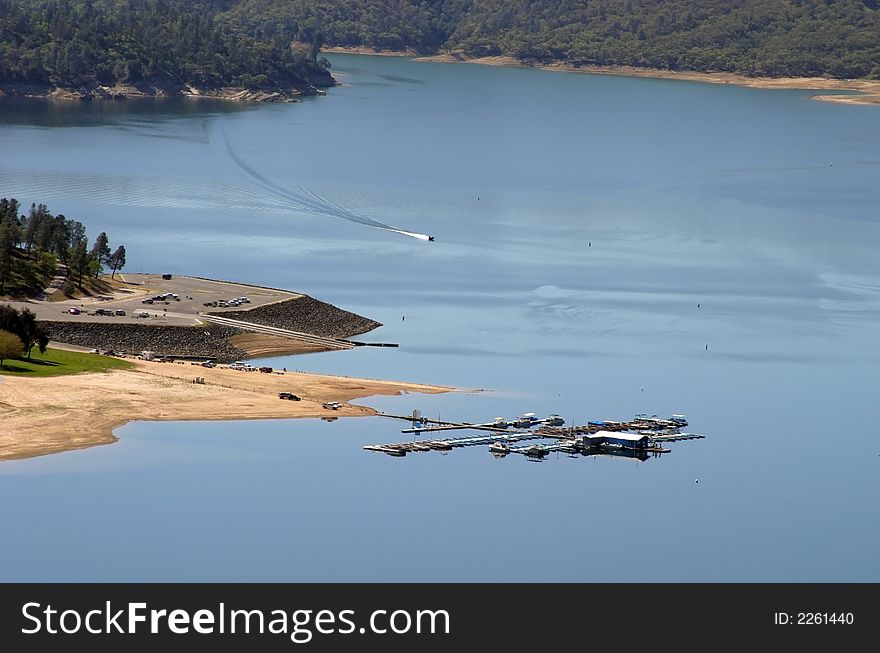 Landscape image of boat docking area of scenic lake.