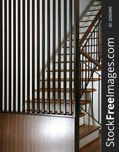 Staircase with feature wall design in timber stripes finishes