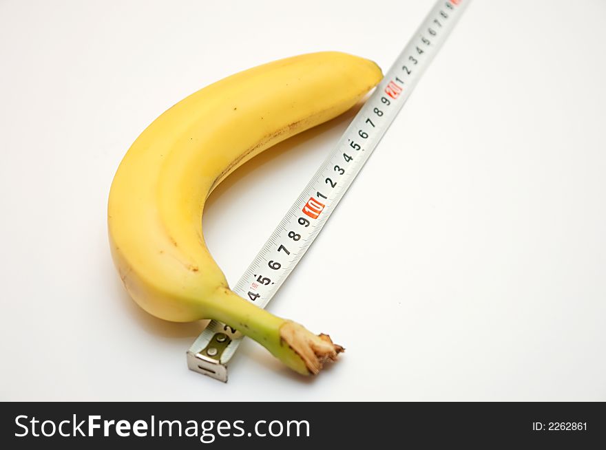 Banana and its size with a measuring roulette