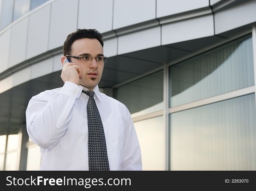 Successful businessman talking on phone
