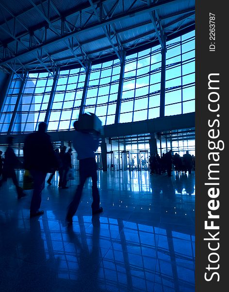 People Silhouettes At Airport