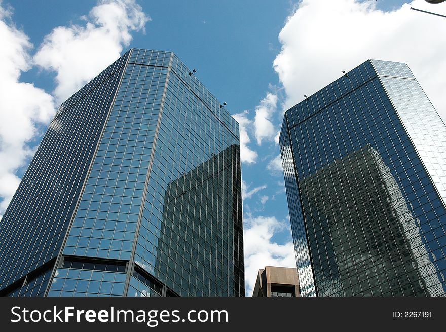 A photo of sky scrapers in downtown denver. A photo of sky scrapers in downtown denver