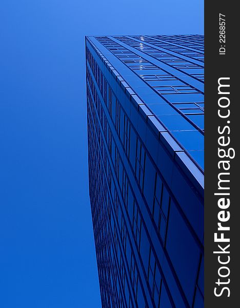 BIG blue building and a nice blue sky.