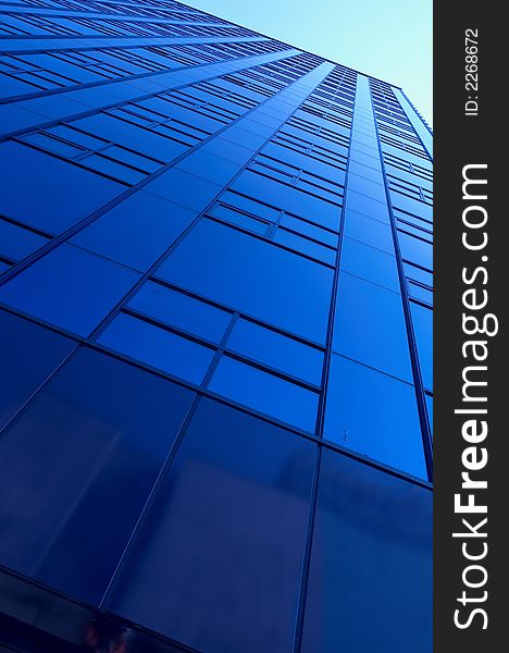 Blue building and a nice blue sky.