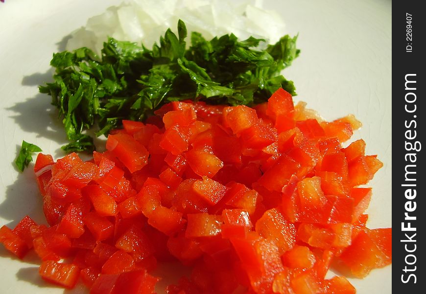 Salad made of pepper, parsley and onion