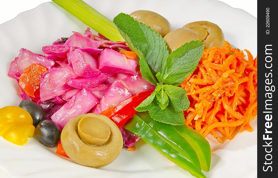 Salad of fresh vegetables with mushrooms and herbs. Salad of fresh vegetables with mushrooms and herbs