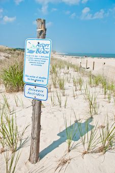 Adopt A Beach Sign Stock Images
