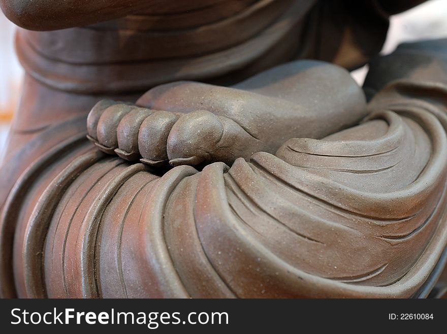 Closeup of Buddha's foot sitting in meditation. Closeup of Buddha's foot sitting in meditation