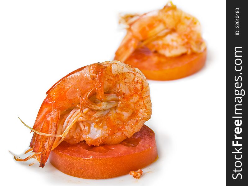 Delicious fried prawn on tomato. Delicious fried prawn on tomato.