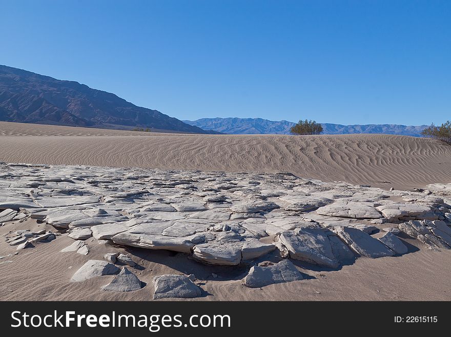 This image captures the intricate patterns of the Mesquite sand dunes in Death Valley National Park. This image captures the intricate patterns of the Mesquite sand dunes in Death Valley National Park.