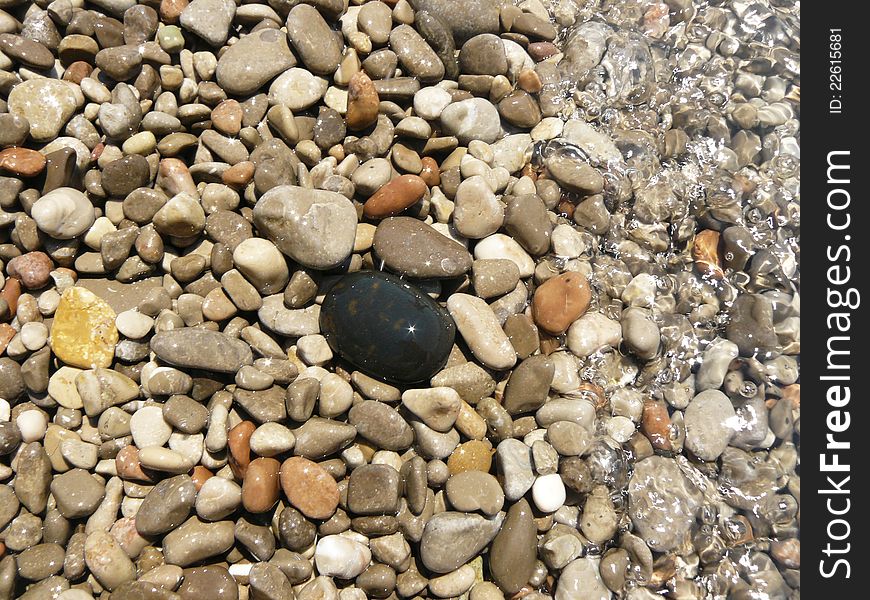 Clear sea water, sea pebbles under water. Clear sea water, sea pebbles under water