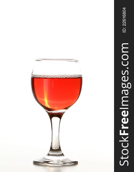 Rose wine in glass isolated on white background. Rose wine in glass isolated on white background