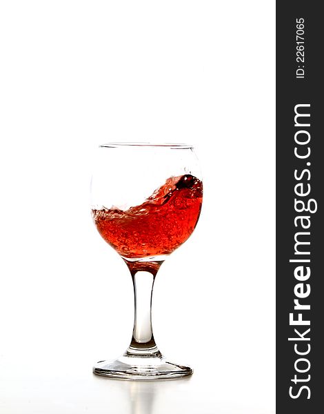 Rose wine in glass isolated on white background. Rose wine in glass isolated on white background