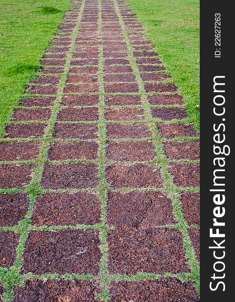 Stone walkway in park of a temple ,Thailand