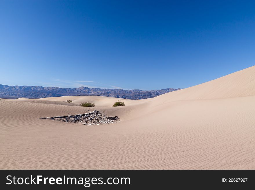 This image captures the intricate patterns of the Mesquite sand dunes in Death Valley National Park. This image captures the intricate patterns of the Mesquite sand dunes in Death Valley National Park.