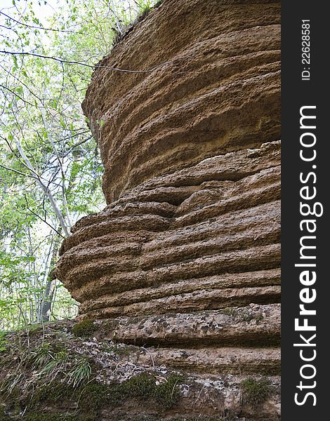 Eroded cliff face in the woods