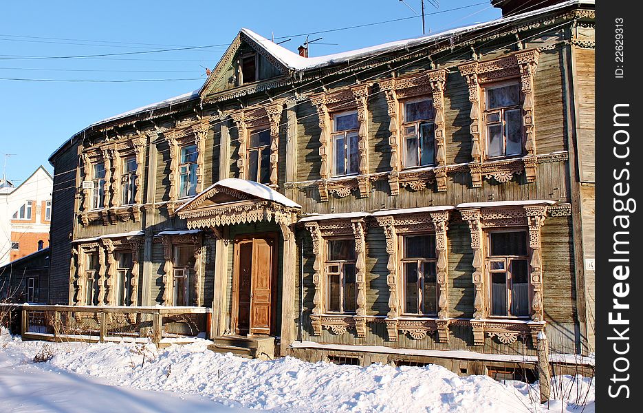 Facade Of The Old Wooden Building In Winter