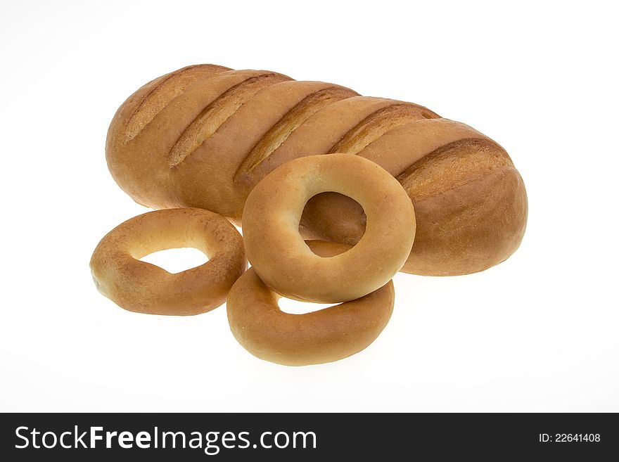Bread and bagels isolated on white background