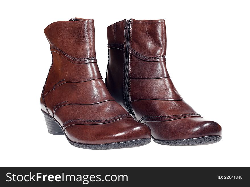 Pair of brown leather women's health boots isolated over white with clipping path. Pair of brown leather women's health boots isolated over white with clipping path