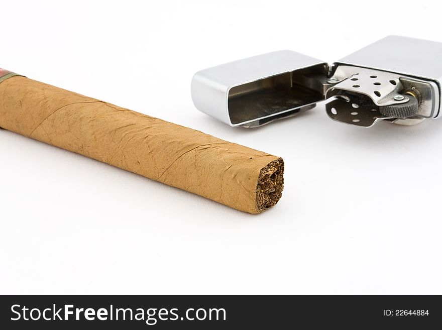 Cigar with cigar lighter on white background