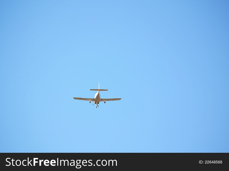 Small airplane approaching the runway for a landing. Small airplane approaching the runway for a landing