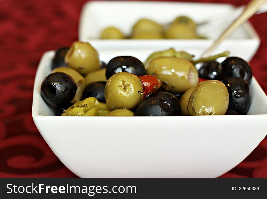 Black and green olives in a bowl. Black and green olives in a bowl