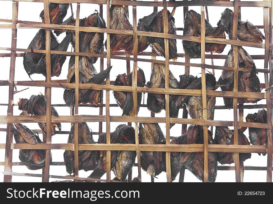 Grilled fish is Drying in a bamboo sieve is the wisdom of Thailand. Grilled fish is Drying in a bamboo sieve is the wisdom of Thailand.