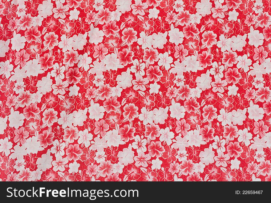 Alternating red and white flower pattern on the cloth. Alternating red and white flower pattern on the cloth.