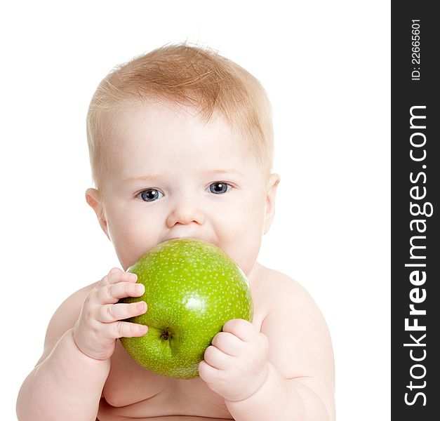 Baby boy holding and eating green apple, isolated on white. Baby boy holding and eating green apple, isolated on white
