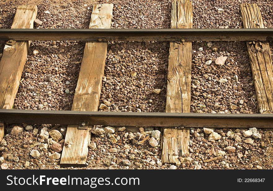 Railway Line With Wooden Sleepers And Gravel