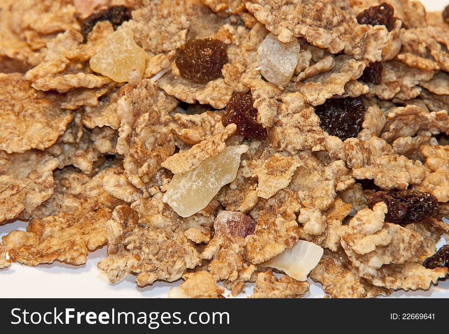 Cereals with dried fruits as a background