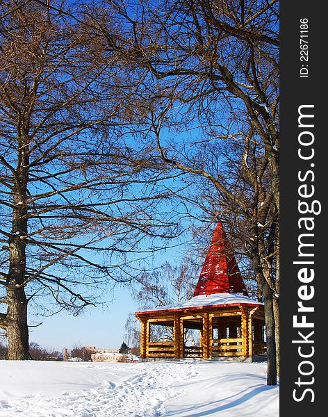 Wooden arbor in park in the winter the city of Ruza Russia