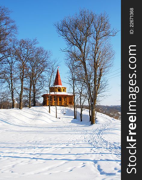 Wooden arbor in park in the winter the city of Ruza Russia