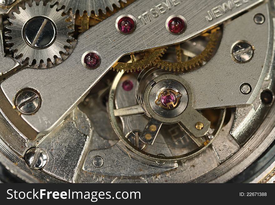 Macro photo of mechanism of an old wrist watch. Macro photo of mechanism of an old wrist watch